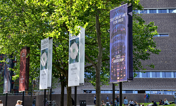 Manifest banner system outside Tate Modern Switch House